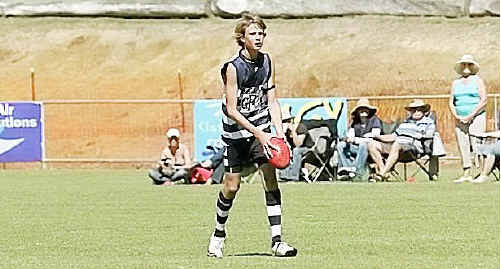 Gympie sporting all-rounder Hayden Tompkins sizes up the goal before unleashing a kick during a game of Australian rules. From footy to athletics to tennis, Tompkins refuses to be boxed in when it comes to his sport. Gympie sporting all-rounder Hayden Tompkins sizes up the goal before unleashing a kick during a game of Australian rules. From footy to athletics to tennis, Tompkins refuses to be boxed in when it comes to his sport.